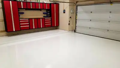 Polyurea Flooring in commercial garage for blog Top 8 Commercial Flooring Types by Omega Contracting & Consulting