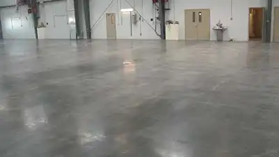 Polished Concrete in commercial warehouse for blog Top 8 Commercial Flooring Types by Omega Contracting & Consulting