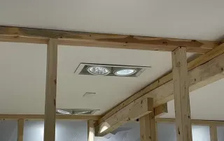 Temporary support walls installed by Omega Contracting to reinforce ceiling during overnight construction