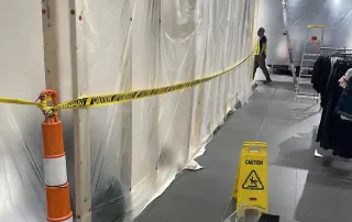 Construction space fully enclosed in protective plastic while retail store remained open for business