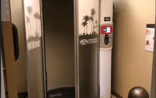 Spray tan booth installed at Palm Beach Tan retail remodel by Omega Contracting & Consulting
